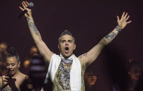 El Gran Concierto de Robbie Williams en Milán: Una Noche Inolvidable de Música y Emoción